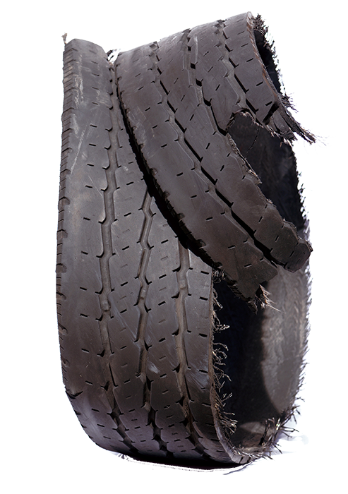 A potential tire case is commonly identified by a tread that has separated from the carcass: 